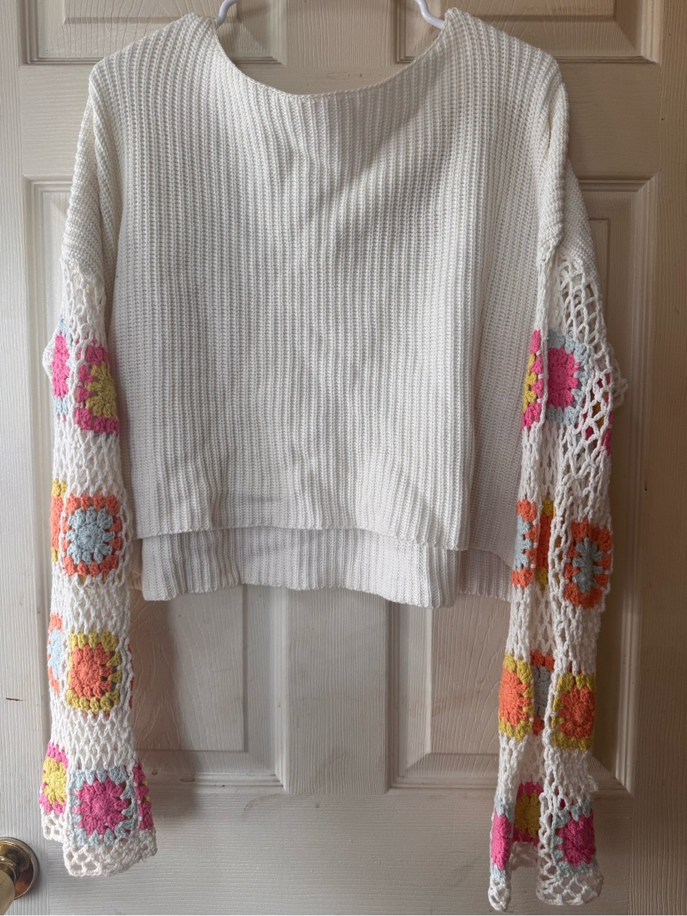 White Crochet-Sleeve Sweater with a Colorful granny square pattern